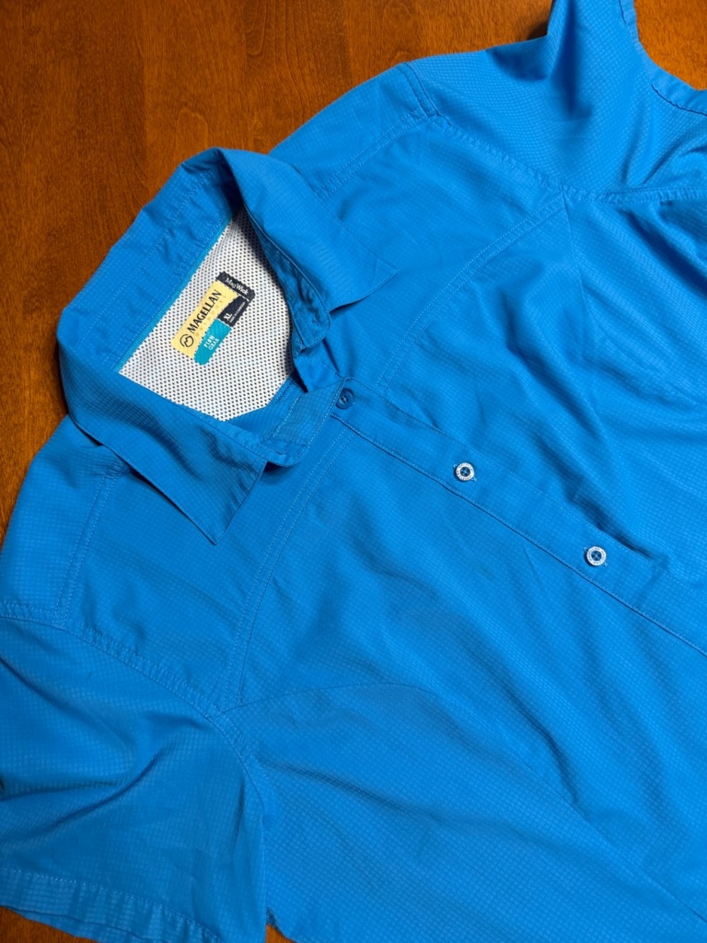 Magellan Outdoors Women’s Short Sleeve Button - Ripstop Blue Fish Gear Magwick